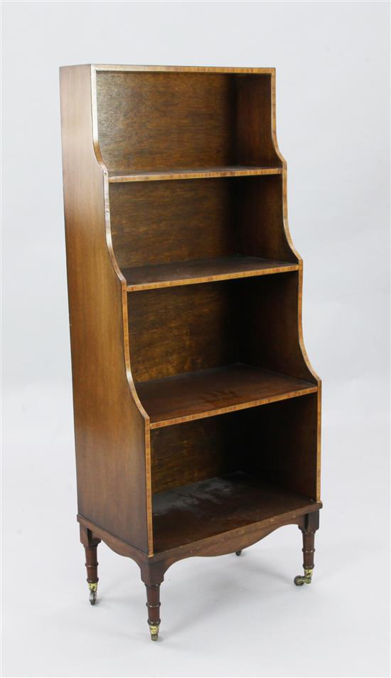 A Sheraton style crossbanded mahogany waterfall bookcase, W.1ft 8in. D.1ft H.4ft 1in.
